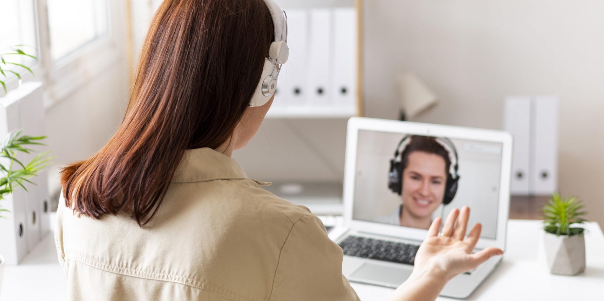 woman-work-having-video-call-laptop